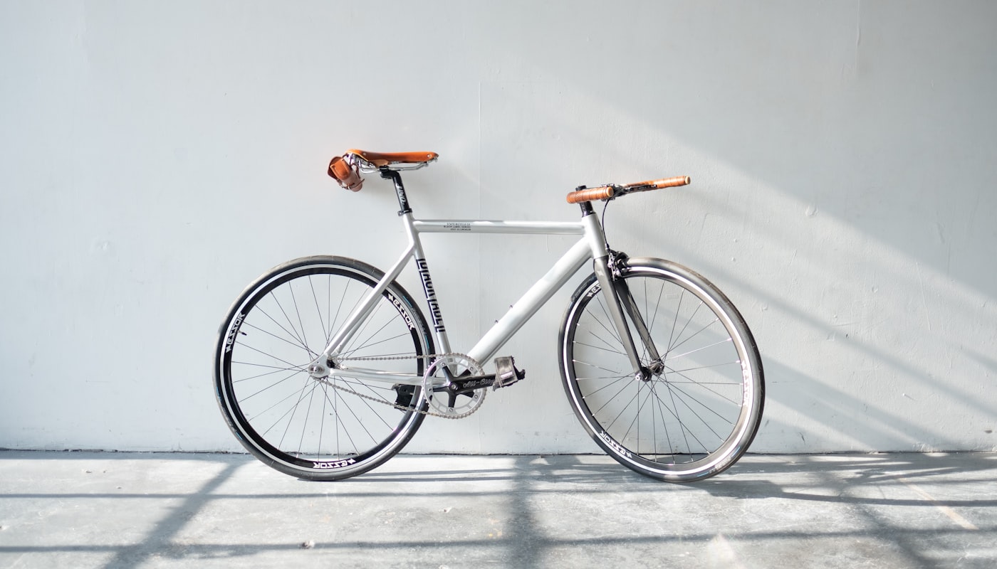 Riley Nicholas 28 Electric bicycle parked on a city bike path highlighting modern e-bike design and urban cycling infrastructure