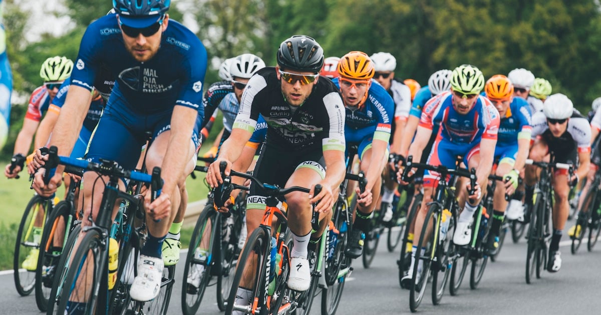 Luke Prowse 29 Cyclists racing during an interval training workout on a road