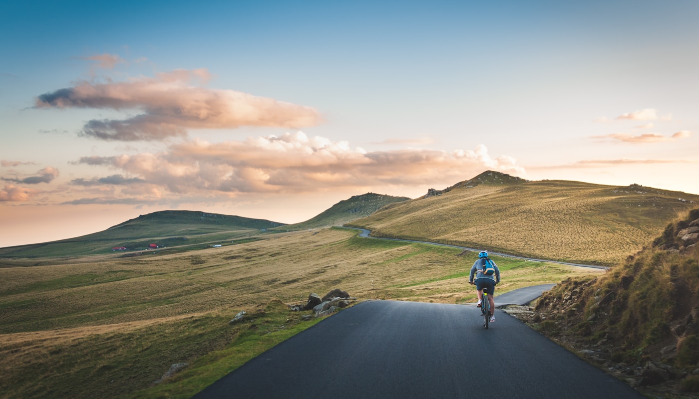 News 69 Cyclists racing through scenic countryside roads during a professional stage race