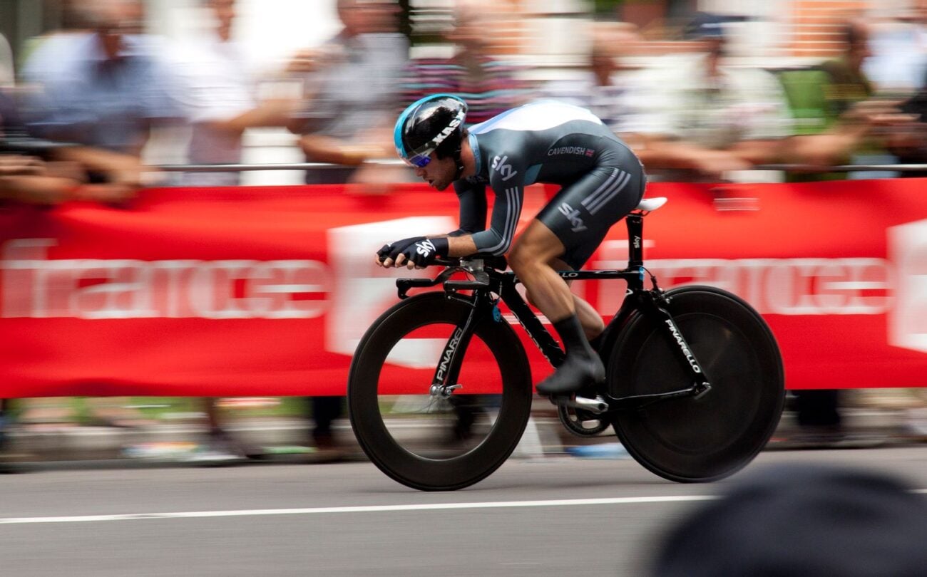 A professional road cyclist in action, illustrating the 2026 Tour de France as Wout van Aert withdraws through injury