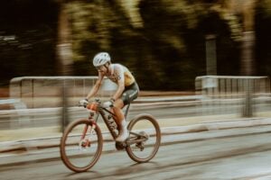 Cyclist climbing a mountain road, illustrating Vuelta a España 2026 stage 12 to Calar Alto